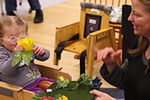 Young deaf-blind child in classroom